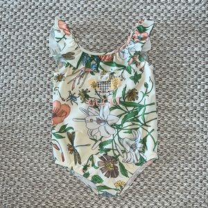 Gucci Kids
Gucci Tennis floral print swimsuit
Sold Out